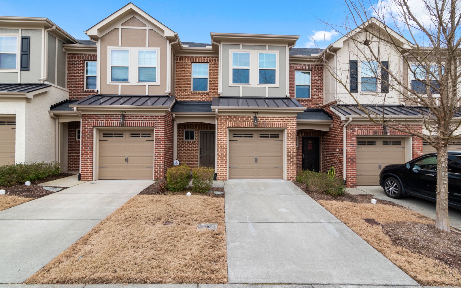Clean residential driveway and sidewalk after pressure washing